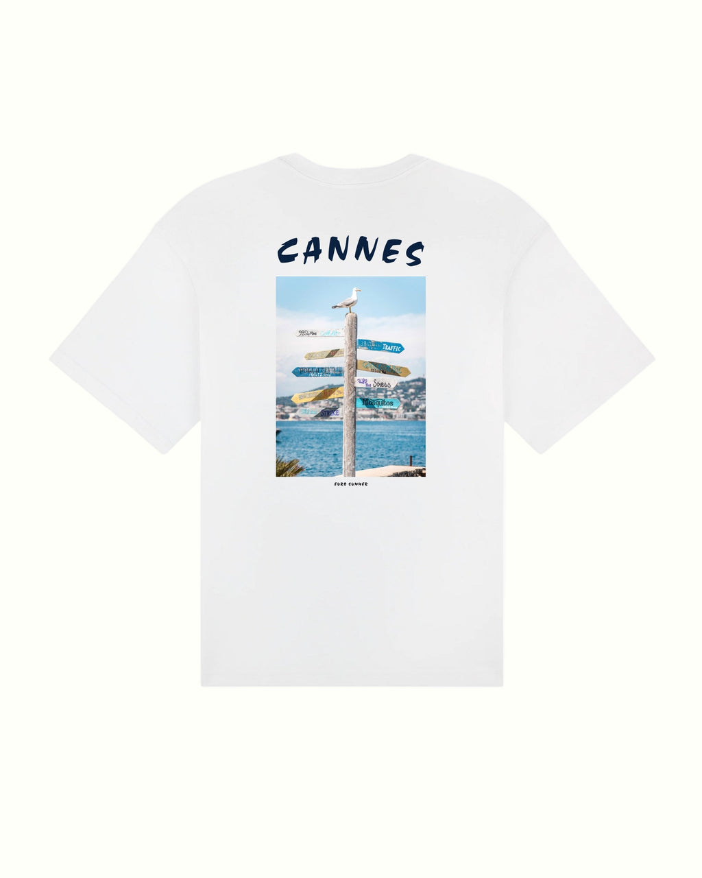 White t-shirt with a graphic design of a beach scene and 'Cannes' text on a white background
