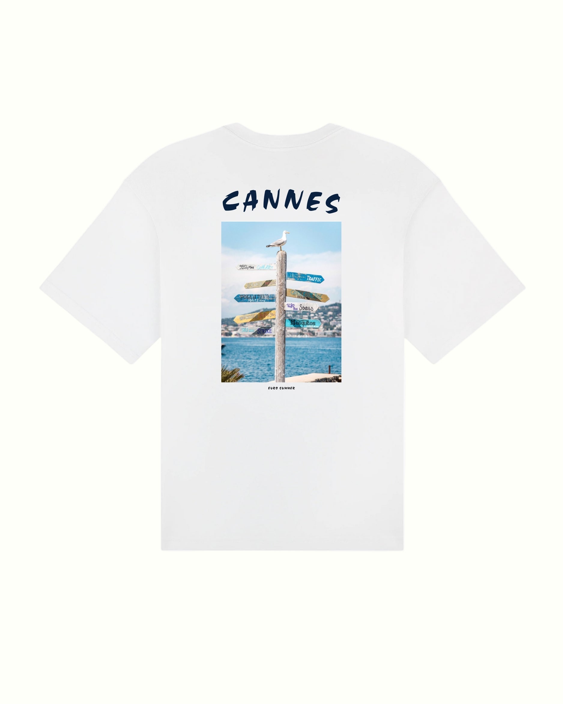 White t-shirt with a graphic design of a beach scene and 'Cannes' text on a white background